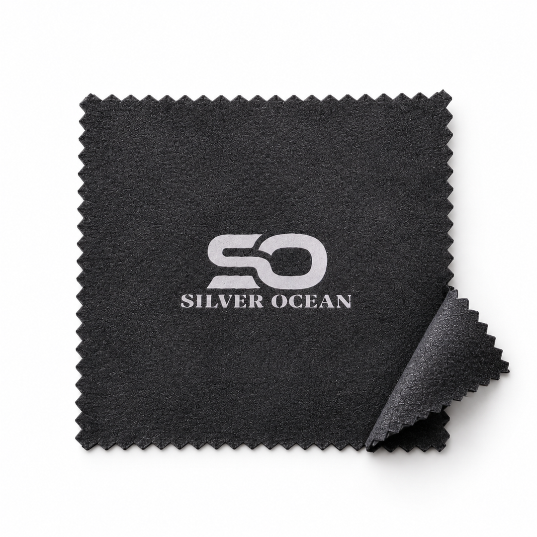 Close-up of the Silver Ocean logo on the black microfiber jewelry cleaning cloth.