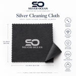 Load image into Gallery viewer, Black Silver Ocean microfiber cleaning cloth for jewelry, showing texture and logo.